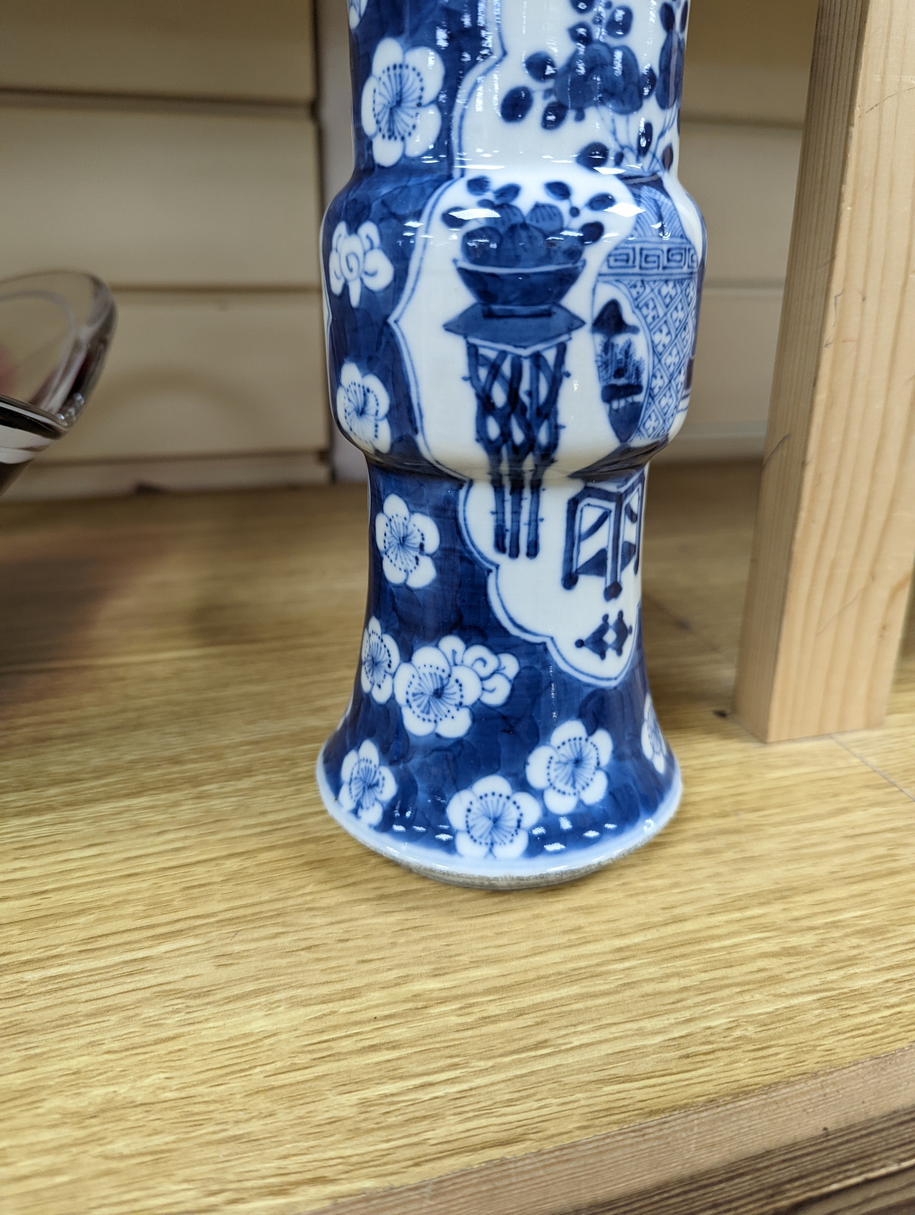 A 19th century Chinese blue and white prunus gu vase, 25 cms high.